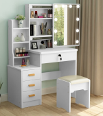 Elegant Design for Modern Beauty Spaces Upgrade your grooming area with the White Dressing Boss Table, a stylish and functional piece designed for makeup lovers, professionals, and anyone who values organized beauty storage. With its modern white finish and spacious layout, this dressing table transforms any room into a refined, clutter-free beauty station. Premium Mirror Setup for Daily Grooming This professional-style mirror section offers clear visibility, ensuring flawless makeup application and grooming. Additionally, the well-sized reflective surface enhances lighting and adds depth to your room. For more tips on designing effective vanity spaces, visit Architectural Digest’s vanity ideas . Spacious Storage for Beauty Essentials The table features multiple drawers and compartments that help you store cosmetics, skincare items, hair tools, and accessories neatly. Consequently, you can keep everything organized and easily accessible. Pair this unit with our White 5-Tier Storage Cabinet or White Foldable Office Table if you need extra storage or a matching white furniture theme. Sleek White Finish for a Modern Aesthetic With its smooth white coating and polished edges, the Dressing Boss Table blends effortlessly into contemporary bedrooms, beauty studios, and professional makeup rooms. Moreover, its minimalist style complements a variety of décor themes, from luxury modern to simple Scandinavian. Key Features Spacious drawers for storing beauty essentials Smooth white finish for a clean, modern appearance Large mirror surface for perfect grooming visibility Durable construction for long-term use Ideal for bedrooms, salons, and beauty rooms Image Alt Attributes: “White dressing boss table with spacious drawers” “Modern white vanity table with mirror setup” The White Dressing Boss Table brings elegance, functionality, and exceptional storage together. Whether you're preparing for work, events, or daily routines, this modern dressing unit enhances your space beautifully while keeping everything organized.