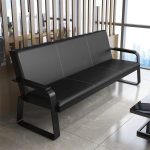 Comfort, Style & Professional Elegance Modern Design for Executive Spaces The 5 Seater Black Office Sofa adds a sleek and professional touch to any office reception or lounge area. Its black finish creates a bold, elegant look. As a result, it enhances the overall image of your workspace. In addition, its modern design blends easily with different office interiors. Spacious Seating for Guests and Teams This sofa provides comfortable seating for up to five people. Therefore, it is ideal for reception areas, waiting rooms, and meeting lounges. Moreover, the wide seating layout ensures that guests and clients sit comfortably. This helps create a welcoming and professional environment. Comfortable Cushioning for Relaxation The sofa features thick, high-density cushioning that offers excellent comfort. As a result, users can sit for long periods without discomfort. In addition, the supportive backrest helps maintain a relaxed sitting posture. This makes it suitable for both short and extended waiting times. Durable Build for Long-Term Use Built with a strong internal frame, the 5 Seater Black Office Sofa ensures long-lasting durability. Therefore, it can handle daily use in busy office environments. Moreover, the high-quality upholstery resists wear and maintains its elegant appearance over time. Easy Maintenance and Practical Use The smooth black surface is easy to clean and maintain. Consequently, it stays neat and professional with minimal effort. In addition, its stain-resistant material helps preserve its clean look even in high-traffic areas. Versatile for Multiple Office Settings This sofa fits perfectly in reception areas, corporate lounges, and executive offices. Furthermore, it pairs well with coffee tables and other office furniture. As a result, you can create a complete and stylish waiting area. Ideal Choice for Professional Environments Ultimately, the 5 Seater Black Office Sofa combines comfort, durability, and modern design in one elegant solution. Upgrade your office today with the 5 Seater Black Office Sofa—where comfort meets professionalism for a welcoming workspace experience.