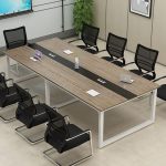 The 10 Seater Boardroom Table is a premium conference table designed to create a professional and collaborative meeting environment. With ample seating for up to ten people, this spacious boardroom table is ideal for executive offices, conference rooms, corporate boardrooms, training centers, and meeting spaces. Its modern design enhances the appearance of any workspace while providing a comfortable setting for presentations, discussions, and decision-making. Constructed from high-quality engineered wood with a durable finish, the table offers exceptional strength, stability, and long-lasting performance. The expansive tabletop provides plenty of room for laptops, documents, projectors, and meeting accessories, while its scratch-resistant surface is easy to clean and maintain. Its sturdy base ensures reliable support during daily use in busy office environments. Whether you're furnishing a new boardroom or upgrading your meeting space, the 10 Seater Boardroom Table combines elegance, functionality, and durability to support productive business meetings. Key Features: Seats up to 10 people comfortably Spacious tabletop for meetings and presentations Modern executive boardroom design Durable engineered wood construction Strong and stable base for reliable support Scratch-resistant, easy-to-clean surface Ideal for conference rooms, executive offices, and training centers Professional appearance that complements modern office interiors Suitable for corporate meetings, team discussions, and client presentations Built for long-lasting everyday use