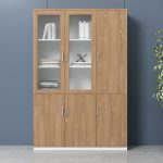 The 3 Door Brown Office Cabinet is a stylish and practical storage solution designed to keep your office organized while enhancing your workspace with a professional appearance. Featuring a rich brown finish and three spacious lockable compartments, this office cabinet provides ample storage for files, documents, office supplies, books, and personal belongings. It is ideal for executive offices, corporate workspaces, schools, libraries, and home offices. Crafted from high-quality engineered wood, the cabinet is built for durability and long-lasting performance. The three-door design offers generous storage space, while the sturdy shelves help keep your items neatly arranged and easily accessible. The smooth, scratch-resistant surface is easy to clean and maintain, ensuring the cabinet retains its elegant appearance even with daily use. Its modern design blends seamlessly with executive desks, workstations, and other office furniture, making it a perfect addition to any professional environment. Whether you're storing confidential files or everyday office essentials, the 3 Door Brown Office Cabinet delivers reliable functionality, security, and timeless style. Key Features Elegant brown wood finish Three spacious storage compartments Lockable doors for added security Durable engineered wood construction Strong internal shelves for organized storage Scratch-resistant and easy-to-clean surface Modern executive office design Ideal for files, books, documents, and office supplies Suitable for offices, home offices, schools, and libraries Built for long-lasting everyday use