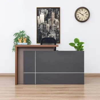 The Brown Reception Office Desk is a stylish and functional reception counter designed to create a professional and welcoming first impression in offices, hotels, hospitals, clinics, schools, salons, and commercial establishments. Featuring a rich brown wood finish and a contemporary design, this reception desk enhances the appearance of your front office while providing an organized workspace for receptionists and customer service staff. Crafted from high-quality engineered wood with a durable construction, the desk is built to withstand the demands of busy commercial environments. Its spacious worktop provides ample room for computers, telephones, printers, office supplies, and customer records. Integrated drawers, shelves, and storage compartments help keep documents and essentials neatly organized, ensuring a clutter-free and efficient workspace. The smooth, scratch-resistant surface is easy to clean and maintain, preserving its elegant appearance for years. Designed for both functionality and style, the Brown Reception Office Desk complements modern, executive, and contemporary office interiors. Whether you're setting up a corporate reception, medical facility, educational institution, or retail business, this reception desk delivers the perfect balance of durability, organization, and professional appeal. Key Features Elegant brown wood finish Spacious reception worktop Durable engineered wood construction Built-in drawers, shelves, and storage compartments Scratch-resistant and easy-to-clean surface Strong and stable design for daily commercial use Professional appearance for reception and customer service areas Suitable for offices, clinics, hospitals, hotels, salons, schools, and retail businesses Space-saving design with ample storage Easy to assemble and built for long-lasting performance