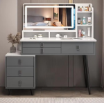 The White Dressing Table With Mirror is a stylish and practical bedroom furniture piece designed to provide a complete grooming and storage solution. Featuring an elegant white finish, spacious tabletop, built-in mirror, and convenient storage compartments, this dressing table adds beauty, organization, and functionality to modern bedrooms, apartments, dressing rooms, and guest spaces. Crafted from high-quality materials, the dressing table offers excellent durability and stability for everyday use. The large mirror provides a clear and comfortable view for makeup, hairstyling, and personal grooming, while the spacious drawers and compartments help keep cosmetics, jewelry, perfumes, skincare products, and accessories neatly organized. Its smooth white surface is easy to clean and maintains a fresh, elegant appearance. With its modern design and practical features, the White Dressing Table With Mirror complements contemporary, minimalist, and luxury bedroom interiors. It is the perfect choice for anyone looking to create a beautiful and organized personal grooming area. Key Features Elegant white modern finish Built-in mirror for convenient grooming Spacious tabletop for beauty essentials Multiple drawers and storage compartments Durable and stable construction Smooth, easy-to-clean surface Stylish design for modern bedrooms Ideal for cosmetics, jewelry, perfumes, and accessories Suitable for bedrooms, apartments, dressing rooms, and guest rooms Built for long-lasting everyday use