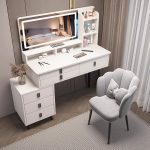 The White Dressing Table With Mirror is a stylish and practical bedroom furniture piece designed to provide a complete grooming and storage solution. Featuring an elegant white finish, spacious tabletop, built-in mirror, and convenient storage compartments, this dressing table adds beauty, organization, and functionality to modern bedrooms, apartments, dressing rooms, and guest spaces. Crafted from high-quality materials, the dressing table offers excellent durability and stability for everyday use. The large mirror provides a clear and comfortable view for makeup, hairstyling, and personal grooming, while the spacious drawers and compartments help keep cosmetics, jewelry, perfumes, skincare products, and accessories neatly organized. Its smooth white surface is easy to clean and maintains a fresh, elegant appearance. With its modern design and practical features, the White Dressing Table With Mirror complements contemporary, minimalist, and luxury bedroom interiors. It is the perfect choice for anyone looking to create a beautiful and organized personal grooming area. Key Features Elegant white modern finish Built-in mirror for convenient grooming Spacious tabletop for beauty essentials Multiple drawers and storage compartments Durable and stable construction Smooth, easy-to-clean surface Stylish design for modern bedrooms Ideal for cosmetics, jewelry, perfumes, and accessories Suitable for bedrooms, apartments, dressing rooms, and guest rooms Built for long-lasting everyday use