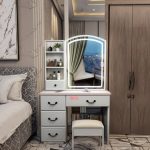 The White Dressing Table With Drawers is a stylish and functional vanity unit designed to bring elegance, organization, and convenience to your bedroom or dressing area. Featuring a clean white finish and multiple spacious drawers, this dressing table provides ample storage for cosmetics, skincare products, jewelry, perfumes, hair accessories, and other personal essentials while enhancing the beauty of your interior. Crafted from high-quality engineered wood, the dressing table is built for durability and long-lasting everyday use. The spacious tabletop offers plenty of room for makeup application, grooming, and decorative accessories, while the smooth, scratch-resistant surface is easy to clean and maintain. The multiple drawers keep your beauty products neatly organized and within easy reach, helping you maintain a tidy and clutter-free space. With its modern minimalist design, the White Dressing Table With Drawers complements contemporary, Scandinavian, and classic bedroom décor. It is perfect for bedrooms, apartments, guest rooms, dressing rooms, and beauty spaces, offering the perfect blend of style, practicality, and durability. Key Features Elegant white contemporary finish Multiple spacious drawers for organized storage Large tabletop for grooming and beauty essentials Durable engineered wood construction Scratch-resistant and easy-to-clean surface Strong and stable design Modern minimalist style Suitable for bedrooms, dressing rooms, apartments, and guest rooms Compact design that saves space Easy to assemble and built for long-lasting use