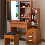 The Brown Dresser Madam Beauty is an elegant and functional bedroom storage solution designed to add style, organization, and convenience to modern living spaces. Featuring a rich brown finish and a sophisticated design, this dresser provides ample storage for clothes, accessories, cosmetics, personal items, and everyday essentials while enhancing the beauty of bedrooms, dressing rooms, and apartments. Crafted from high-quality materials, the Brown Dresser Madam Beauty offers excellent durability, stability, and long-lasting performance. Its spacious drawers provide convenient storage while keeping belongings neatly arranged and easily accessible. The smooth surface is easy to clean and maintain, ensuring the dresser retains its elegant appearance over time. Designed to complement modern, classic, and contemporary interiors, this dresser combines practicality with timeless style. Whether used in a master bedroom, guest room, apartment, or beauty space, the Brown Dresser Madam Beauty provides a perfect blend of storage capacity, elegance, and functionality. Key Features Elegant brown wood finish Spacious drawers for organized storage Durable and stable construction Smooth, easy-to-clean surface Stylish design for modern bedrooms Ideal for clothes, accessories, cosmetics, and personal items Space-saving storage solution Suitable for bedrooms, dressing rooms, apartments, and beauty areas Complements contemporary and classic interiors Built for long-lasting everyday use