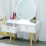 The White Modern Dressing Table is a stylish and functional furniture piece designed to add elegance and convenience to your bedroom or dressing area. Featuring a sleek white finish and a contemporary design, this dressing table provides the perfect space for your daily makeup, skincare, and grooming routine while enhancing the overall look of your interior. Crafted from high-quality engineered wood, the dressing table is built for durability and long-lasting performance. Its spacious tabletop offers plenty of room for cosmetics, perfumes, beauty accessories, and decorative items, while the integrated drawers provide ample storage to keep your essentials neatly organized and easily accessible. The smooth, scratch-resistant surface is easy to clean, making it ideal for everyday use. Designed to complement modern, minimalist, and contemporary décor, the White Modern Dressing Table is perfect for bedrooms, apartments, dressing rooms, and guest rooms. Whether you're furnishing a new home or upgrading your bedroom furniture, this dressing table delivers the perfect combination of style, functionality, and lasting quality. Key Features Elegant modern white finish Spacious tabletop for makeup and beauty essentials Multiple storage drawers for organized storage Durable engineered wood construction Smooth, scratch-resistant, and easy-to-clean surface Strong and stable design for everyday use Compact and space-saving for smaller rooms Suitable for bedrooms, dressing rooms, apartments, and guest rooms Complements modern, minimalist, and contemporary interiors Easy to assemble and built for long-lasting durability