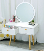 The White Modern Dressing Table is a stylish and functional furniture piece designed to add elegance and convenience to your bedroom or dressing area. Featuring a sleek white finish and a contemporary design, this dressing table provides the perfect space for your daily makeup, skincare, and grooming routine while enhancing the overall look of your interior. Crafted from high-quality engineered wood, the dressing table is built for durability and long-lasting performance. Its spacious tabletop offers plenty of room for cosmetics, perfumes, beauty accessories, and decorative items, while the integrated drawers provide ample storage to keep your essentials neatly organized and easily accessible. The smooth, scratch-resistant surface is easy to clean, making it ideal for everyday use. Designed to complement modern, minimalist, and contemporary décor, the White Modern Dressing Table is perfect for bedrooms, apartments, dressing rooms, and guest rooms. Whether you're furnishing a new home or upgrading your bedroom furniture, this dressing table delivers the perfect combination of style, functionality, and lasting quality. Key Features Elegant modern white finish Spacious tabletop for makeup and beauty essentials Multiple storage drawers for organized storage Durable engineered wood construction Smooth, scratch-resistant, and easy-to-clean surface Strong and stable design for everyday use Compact and space-saving for smaller rooms Suitable for bedrooms, dressing rooms, apartments, and guest rooms Complements modern, minimalist, and contemporary interiors Easy to assemble and built for long-lasting durability