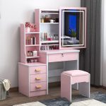 The Brown Dressing Table with Mirror is a stylish and functional furniture piece designed to bring elegance and convenience to your bedroom or dressing area. Featuring a rich brown finish and a large built-in mirror, this dressing table provides the perfect space for your daily grooming, makeup, and skincare routine. Its timeless design complements modern, contemporary, and classic bedroom interiors. Crafted from high-quality engineered wood, the dressing table is built for durability and long-lasting performance. It includes spacious drawers that offer ample storage for cosmetics, jewelry, hair accessories, perfumes, and other personal essentials, helping you keep your space neat and organized. The wide tabletop provides additional room for decorative items and beauty products, while the smooth surface is easy to clean and maintain. Whether you're furnishing a new home or upgrading your bedroom, the Brown Dressing Table with Mirror combines style, practicality, and durability to create a beautiful and organized personal space. Key Features: Elegant brown wood finish Large built-in mirror Spacious storage drawers for cosmetics and accessories Durable engineered wood construction Wide tabletop for beauty essentials and décor Smooth, scratch-resistant, and easy-to-clean surface Strong and stable design for everyday use Suitable for bedrooms, apartments, dressing rooms, and guest rooms Complements modern, classic, and contemporary interiors Easy to assemble and built for long-lasting durability