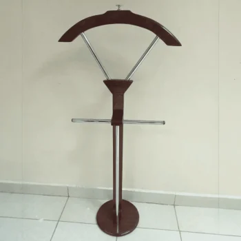 The Brown Mahogany Coat Hanger is an elegant and practical storage solution designed to keep coats, jackets, hats, scarves, and accessories neatly organized while adding a touch of classic style to your space. Featuring a rich mahogany brown finish, this coat hanger brings warmth and sophistication to offices, homes, reception areas, hotels, bedrooms, and entryways. Crafted from high-quality materials, the coat hanger offers excellent durability and stability for everyday use. Its sturdy construction provides reliable support for multiple garments, while the stylish design complements executive offices, modern interiors, and traditional décor. The compact footprint makes it ideal for organizing clothing without taking up excessive floor space. Perfect for professional and residential environments, the Brown Mahogany Coat Hanger combines functionality, elegance, and convenience to create a neat and organized dressing or waiting area. Key Features Elegant mahogany brown finish Stylish and functional coat storage design Strong and durable construction Multiple hooks for coats, jackets, hats, and accessories Space-saving vertical design Stable base for secure placement Suitable for offices, homes, hotels, bedrooms, and reception areas Enhances organization and interior appearance Easy to clean and maintain Built for long-lasting everyday use