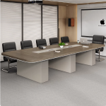 The 3 Meter Boardroom Office Table is a premium executive conference table designed to accommodate large meetings, board discussions, presentations, and team collaborations in professional environments. With an impressive 3-meter tabletop, this boardroom table offers ample space for multiple participants, laptops, documents, conference equipment, and meeting essentials, making it the ideal centerpiece for corporate offices, boardrooms, conference rooms, government institutions, and executive meeting spaces. Crafted from high-quality engineered wood and supported by a robust frame, the table is built for exceptional durability, stability, and long-lasting performance. Its spacious work surface ensures every participant has enough room to work comfortably, while the scratch-resistant finish is easy to clean and maintain. The elegant design complements modern, executive, and contemporary office interiors, creating a professional atmosphere that leaves a lasting impression on clients and business partners. Whether you're furnishing a new boardroom or upgrading your existing conference space, the 3 Meter Boardroom Office Table combines sophistication, functionality, and durability to support productive meetings and business success. Key Features Spacious 3-meter conference tabletop Modern executive boardroom table design Durable engineered wood construction Strong and stable support frame Scratch-resistant and easy-to-clean surface Large workspace for meetings, presentations, and collaboration Suitable for boardrooms, conference rooms, executive offices, and institutions Professional appearance for corporate environments Spacious design accommodates multiple users comfortably Easy to assemble and built for long-lasting commercial use