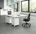 The 2 Way White Office Workstation is a modern and space-saving office furniture solution designed to provide an efficient and comfortable workspace for two users. Featuring a sleek white finish and a contemporary design, this workstation enhances the appearance of any office while promoting collaboration, productivity, and organization. It is ideal for corporate offices, startups, co-working spaces, call centers, educational institutions, and home offices. Constructed from high-quality engineered wood and supported by a sturdy steel frame, the workstation is built for durability and long-term performance. Each user enjoys a spacious work surface for laptops, desktop computers, files, and office accessories, ensuring a clutter-free and productive working environment. The scratch-resistant tabletop is easy to clean, while the strong frame provides excellent stability for everyday use. Designed to maximize office space without compromising comfort, the 2 Way White Office Workstation blends seamlessly with modern, minimalist, and contemporary office interiors. It is an excellent choice for businesses looking to create a professional and organized workspace. Key Features Two-person office workstation design Elegant white modern finish Spacious individual workstations Durable engineered wood tabletop Heavy-duty steel frame for enhanced stability Scratch-resistant and easy-to-clean surface Space-saving design for efficient office layouts Suitable for offices, co-working spaces, call centers, schools, and home offices Modern appearance that complements contemporary interiors Easy to assemble and built for long-lasting daily use