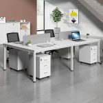 The 2 Way White Office Workstation is a modern and space-saving office furniture solution designed to provide an efficient and comfortable workspace for two users. Featuring a sleek white finish and a contemporary design, this workstation enhances the appearance of any office while promoting collaboration, productivity, and organization. It is ideal for corporate offices, startups, co-working spaces, call centers, educational institutions, and home offices. Constructed from high-quality engineered wood and supported by a sturdy steel frame, the workstation is built for durability and long-term performance. Each user enjoys a spacious work surface for laptops, desktop computers, files, and office accessories, ensuring a clutter-free and productive working environment. The scratch-resistant tabletop is easy to clean, while the strong frame provides excellent stability for everyday use. Designed to maximize office space without compromising comfort, the 2 Way White Office Workstation blends seamlessly with modern, minimalist, and contemporary office interiors. It is an excellent choice for businesses looking to create a professional and organized workspace. Key Features Two-person office workstation design Elegant white modern finish Spacious individual workstations Durable engineered wood tabletop Heavy-duty steel frame for enhanced stability Scratch-resistant and easy-to-clean surface Space-saving design for efficient office layouts Suitable for offices, co-working spaces, call centers, schools, and home offices Modern appearance that complements contemporary interiors Easy to assemble and built for long-lasting daily use