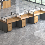 The 6 Way Office Workstation is a modern and efficient office furniture solution designed to maximize productivity while optimizing office space. Built to accommodate up to six users comfortably, this workstation is ideal for corporate offices, call centers, co-working spaces, startups, and open-plan work environments. Its modular design encourages collaboration while providing each employee with a dedicated workspace for improved focus and efficiency. Constructed from high-quality engineered wood and supported by a heavy-duty steel frame, the workstation offers exceptional strength, stability, and durability. Each workstation features a spacious desktop that comfortably accommodates computers, laptops, documents, and office accessories. Integrated cable management helps keep wires organized and the workspace clutter-free, while privacy partitions provide employees with a more focused and professional working environment. With its sleek contemporary design and space-saving layout, the 6 Way Office Workstation enhances office aesthetics while promoting teamwork and organization. It is the perfect solution for businesses seeking a functional, stylish, and long-lasting workstation system. Key Features Accommodates up to six users comfortably Modern modular office workstation design Spacious individual workstations Durable engineered wood construction Heavy-duty steel frame for superior stability Privacy partitions for enhanced concentration Integrated cable management system Scratch-resistant and easy-to-clean work surfaces Ideal for corporate offices, startups, co-working spaces, and call centers Easy to assemble and built for long-lasting commercial use