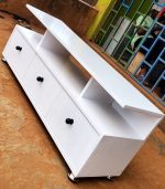 1.8 meters wooden tv stand, 1.8 meter wooden tv stand, 1.8m wooden tv stand, 180cm wooden tv stand, 1.8 meters tv cabinet, 1.8 meter tv cabinet, 1.8m tv cabinet, 180cm tv cabinet, wooden tv stand, wooden tv cabinet, wooden tv console, wooden tv unit, tv stand with storage, wooden tv stand with storage, tv cabinet with storage, wooden entertainment unit, wooden media console, wooden tv console table, living room tv stand, living room tv cabinet, modern wooden tv stand, modern tv cabinet, contemporary wooden tv stand, stylish wooden tv stand, elegant wooden tv stand, minimalist wooden tv stand, solid wood tv stand, wooden media cabinet, wooden entertainment cabinet, wooden television stand, television cabinet wooden, tv furniture kenya, tv stand kenya, wooden tv stand kenya, 1.8m tv stand kenya, 1.8 meter tv stand kenya, 1.8 meters tv stand kenya, 180cm tv stand kenya, The 1.8 Meters Wooden TV Stand provides a spacious and organized base for your television and entertainment equipment. Its 1.8-meter width offers enough room for a large TV, decoder, sound system, gaming console, remote controls, and decorative accessories. The wooden design adds a warm and elegant touch to living rooms and entertainment spaces. 1.8 Meters Wooden TV Stand, 1.8 Meters Wooden TV Stand Kenya, 1.8 Meters Wooden TV Stand Nairobi, 1.8 Meters Wooden TV Stand Kisumu, 1.8 Meters Wooden TV Stand Kisii, 1.8 Meters Wooden TV Stand Mombasa, 1.8 Meters Wooden TV Stand Nakuru, 1.8 Meters Wooden TV Stand Eldoret, 1.8 Meters Wooden TV Stand Thika, 1.8 Meters Wooden TV Stand Machakos, 1.8 Meters Wooden TV Stand Nyeri, 1.8 Meters Wooden TV Stand Meru, 1.8 Meters Wooden TV Stand Kakamega, 1.8 Meters Wooden TV Stand Kitale, 1.8 Meters Wooden TV Stand Kericho, 1.8 Meters Wooden TV Stand Bungoma, 1.8 Meters Wooden TV Stand Malindi, 1.8 Meters Wooden TV Stand Naivasha, 1.8 Meters Wooden TV Stand Nanyuki, 1.8 Meters Wooden TV Stand Migori, 1.8 Meters Wooden TV Stand Homa Bay, 1.8 Meters Wooden TV Stand Siaya, 1.8 Meters Wooden TV Stand Busia, 1.8 meters wooden tv stand delivery kenya, 1.8 meters wooden tv stand delivery nairobi, 1.8 meters wooden tv stand delivery kisumu, 1.8 meters wooden tv stand delivery mombasa, 1.8 meters wooden tv stand delivery kisii, 1.8 meters wooden tv stand delivery nakuru, 1.8 meters wooden tv stand delivery eldoret, 1.8 meters wooden tv stand delivery thika, 1.8 meters wooden tv stand delivery kiambu, 1.8 meters wooden tv stand delivery machakos, 1.8 meters wooden tv stand delivery nyeri, 1.8 meters wooden tv stand delivery kakamega, 1.8 meters wooden tv stand delivery homa bay, 1.8 meters wooden tv stand delivery migori, 1.8 meters wooden tv stand delivery kericho, 1.8 meters wooden tv stand delivery bungoma, 1.8 meters wooden tv stand delivery siaya, 1.8 meters wooden tv stand delivery vihiga, 1.8 meters wooden tv stand delivery kitale, 1.8 meters wooden tv stand delivery naivasha, 1.8 meters wooden tv stand delivery meru, 1.8 meters wooden tv stand delivery embu Ideal for living rooms, bedrooms, lounges, apartments, offices, hotels, and entertainment areas, the 1.8 Meters Wooden TV Stand helps create a neat and organized media space. Its spacious design makes it suitable for larger television setups while providing convenient storage and display space for everyday essentials. Combining functionality with a classic wooden appearance, it is a practical addition to modern and traditional interiors. The 1.8 Meters Wooden TV Stand is a practical entertainment furniture piece designed to provide a stable and organized space for your television and media equipment. Its 1.8-meter width offers a generous surface for placing a TV, while the wooden design adds a warm and classic appearance to the living room. It is suitable for homes, apartments, lounges, bedrooms, offices, and entertainment areas The 1.8 Meters Wooden TV Stand is a practical and stylish addition to modern living rooms. With a 1.8-meter width, it provides a spacious surface for placing a television and creating an organized entertainment area. Its wooden design adds a warm, natural appearance that can complement different living room furniture and interior styles. The 1.8 Meters Wooden TV Stand is a stylish and practical entertainment unit designed to support your television while providing space for media accessories and household essentials. Its 1.8-meter length offers a generous surface for different TV sizes, while the wooden construction adds a warm and classic touch to the living room.