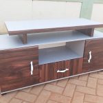 1.8 meters wooden tv stand, 1.8 meter wooden tv stand, 1.8m wooden tv stand, 180cm wooden tv stand, 1.8 meters tv cabinet, 1.8 meter tv cabinet, 1.8m tv cabinet, 180cm tv cabinet, wooden tv stand, wooden tv cabinet, wooden tv console, wooden tv unit, tv stand with storage, wooden tv stand with storage, tv cabinet with storage, wooden entertainment unit, wooden media console, wooden tv console table, living room tv stand, living room tv cabinet, modern wooden tv stand, modern tv cabinet, contemporary wooden tv stand, stylish wooden tv stand, elegant wooden tv stand, minimalist wooden tv stand, solid wood tv stand, wooden media cabinet, wooden entertainment cabinet, wooden television stand, television cabinet wooden, tv furniture kenya, tv stand kenya, wooden tv stand kenya, 1.8m tv stand kenya, 1.8 meter tv stand kenya, 1.8 meters tv stand kenya, 180cm tv stand kenya, The 1.8 Meters Wooden TV Stand provides a spacious and organized base for your television and entertainment equipment. Its 1.8-meter width offers enough room for a large TV, decoder, sound system, gaming console, remote controls, and decorative accessories. The wooden design adds a warm and elegant touch to living rooms and entertainment spaces. 1.8 Meters Wooden TV Stand, 1.8 Meters Wooden TV Stand Kenya, 1.8 Meters Wooden TV Stand Nairobi, 1.8 Meters Wooden TV Stand Kisumu, 1.8 Meters Wooden TV Stand Kisii, 1.8 Meters Wooden TV Stand Mombasa, 1.8 Meters Wooden TV Stand Nakuru, 1.8 Meters Wooden TV Stand Eldoret, 1.8 Meters Wooden TV Stand Thika, 1.8 Meters Wooden TV Stand Machakos, 1.8 Meters Wooden TV Stand Nyeri, 1.8 Meters Wooden TV Stand Meru, 1.8 Meters Wooden TV Stand Kakamega, 1.8 Meters Wooden TV Stand Kitale, 1.8 Meters Wooden TV Stand Kericho, 1.8 Meters Wooden TV Stand Bungoma, 1.8 Meters Wooden TV Stand Malindi, 1.8 Meters Wooden TV Stand Naivasha, 1.8 Meters Wooden TV Stand Nanyuki, 1.8 Meters Wooden TV Stand Migori, 1.8 Meters Wooden TV Stand Homa Bay, 1.8 Meters Wooden TV Stand Siaya, 1.8 Meters Wooden TV Stand Busia, 1.8 meters wooden tv stand delivery kenya, 1.8 meters wooden tv stand delivery nairobi, 1.8 meters wooden tv stand delivery kisumu, 1.8 meters wooden tv stand delivery mombasa, 1.8 meters wooden tv stand delivery kisii, 1.8 meters wooden tv stand delivery nakuru, 1.8 meters wooden tv stand delivery eldoret, 1.8 meters wooden tv stand delivery thika, 1.8 meters wooden tv stand delivery kiambu, 1.8 meters wooden tv stand delivery machakos, 1.8 meters wooden tv stand delivery nyeri, 1.8 meters wooden tv stand delivery kakamega, 1.8 meters wooden tv stand delivery homa bay, 1.8 meters wooden tv stand delivery migori, 1.8 meters wooden tv stand delivery kericho, 1.8 meters wooden tv stand delivery bungoma, 1.8 meters wooden tv stand delivery siaya, 1.8 meters wooden tv stand delivery vihiga, 1.8 meters wooden tv stand delivery kitale, 1.8 meters wooden tv stand delivery naivasha, 1.8 meters wooden tv stand delivery meru, 1.8 meters wooden tv stand delivery embu Ideal for living rooms, bedrooms, lounges, apartments, offices, hotels, and entertainment areas, the 1.8 Meters Wooden TV Stand helps create a neat and organized media space. Its spacious design makes it suitable for larger television setups while providing convenient storage and display space for everyday essentials. Combining functionality with a classic wooden appearance, it is a practical addition to modern and traditional interiors. The 1.8 Meters Wooden TV Stand is a practical entertainment furniture piece designed to provide a stable and organized space for your television and media equipment. Its 1.8-meter width offers a generous surface for placing a TV, while the wooden design adds a warm and classic appearance to the living room. It is suitable for homes, apartments, lounges, bedrooms, offices, and entertainment areas The 1.8 Meters Wooden TV Stand is a practical and stylish addition to modern living rooms. With a 1.8-meter width, it provides a spacious surface for placing a television and creating an organized entertainment area. Its wooden design adds a warm, natural appearance that can complement different living room furniture and interior styles. The 1.8 Meters Wooden TV Stand is a stylish and practical entertainment unit designed to support your television while providing space for media accessories and household essentials. Its 1.8-meter length offers a generous surface for different TV sizes, while the wooden construction adds a warm and classic touch to the living room.